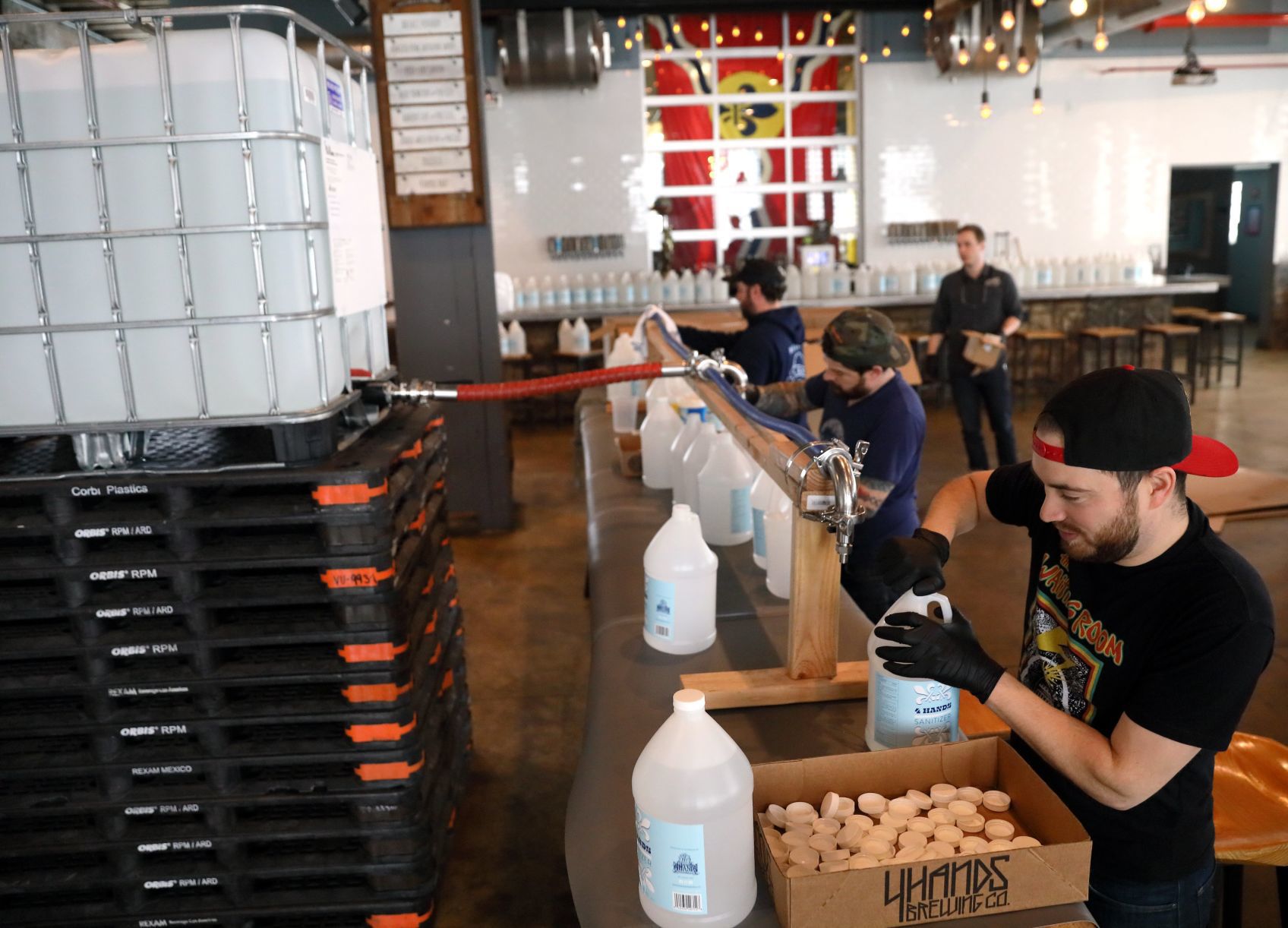 4 Hands Brewing packages hand sanitizer
